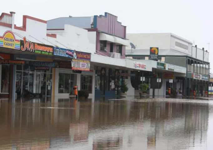 Floodwaters enter shops in the retail and business centre of Ingham. Picture - Mark and Belinda Doyle of Lee's Hotel